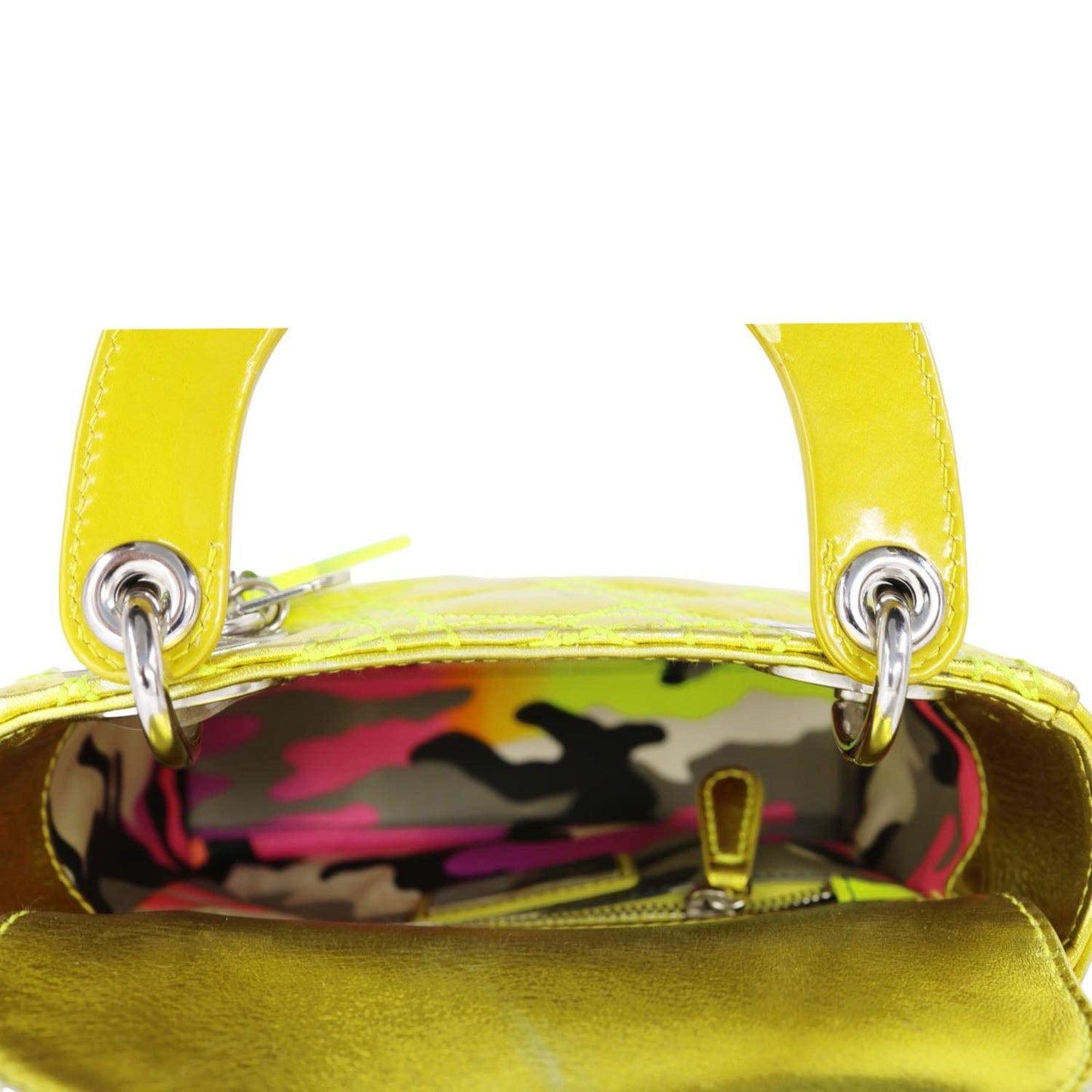 Interior of CHRISTIAN DIOR Lady Dior Mini Metallic Leather Shoulder Bag Neon Yellow showing colorful lining and bag details.