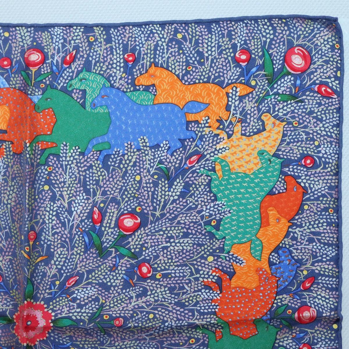 Illustrated unicorns on authentic vintage Hermes silk scarf