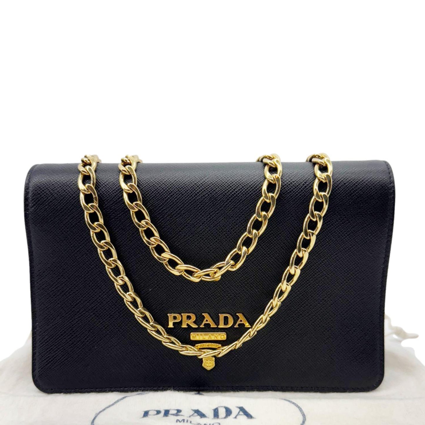 PRADA Saffiano Lux Chain Crossbody Bag Black with gold chain and logo, sleek design, dust bag in background.