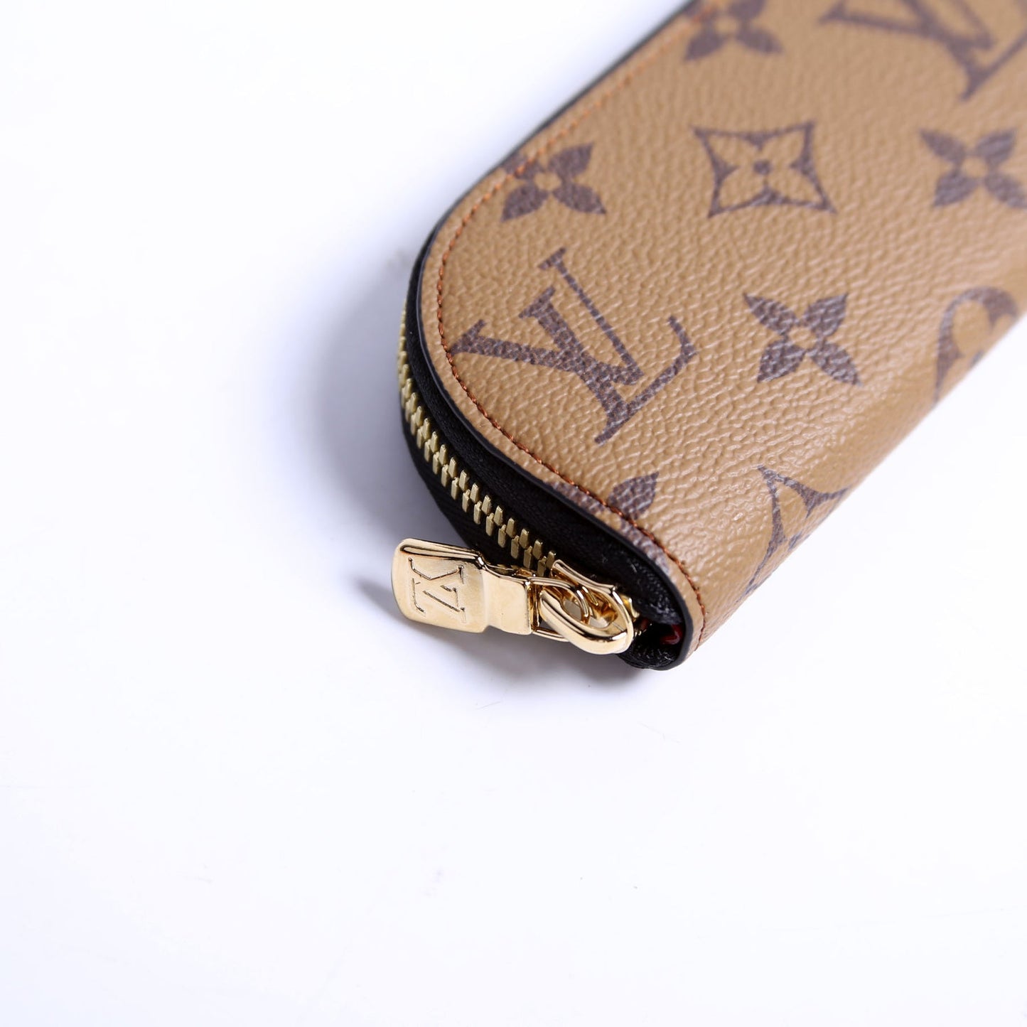 Louis Vuitton Come and Play With Me Charlotte Pencil Pouch Reverse Monogram with gold zipper and brown monogram pattern.