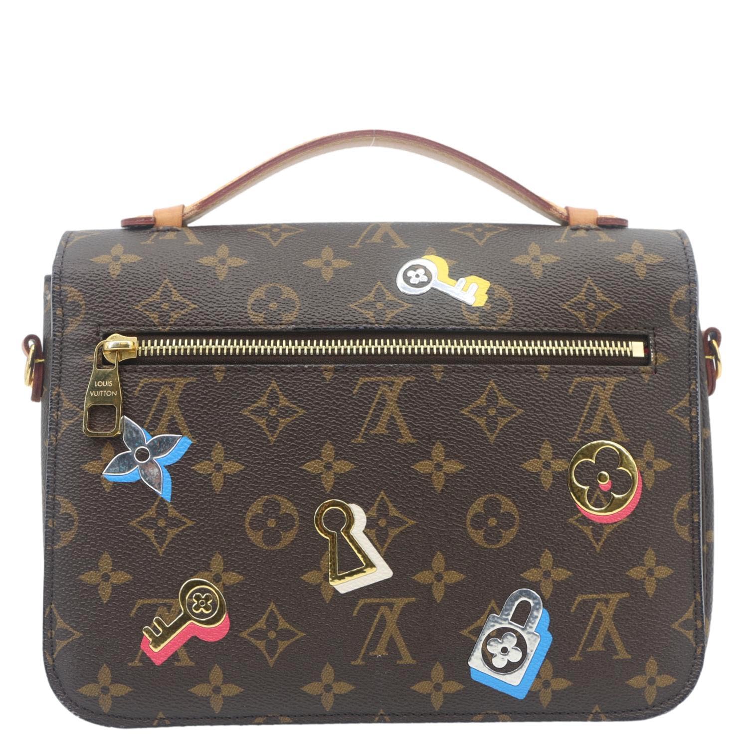LOUIS VUITTON Lovelock Metis Pochette Patches Monogram Canvas Crossbody Bag Brown with playful patch details.