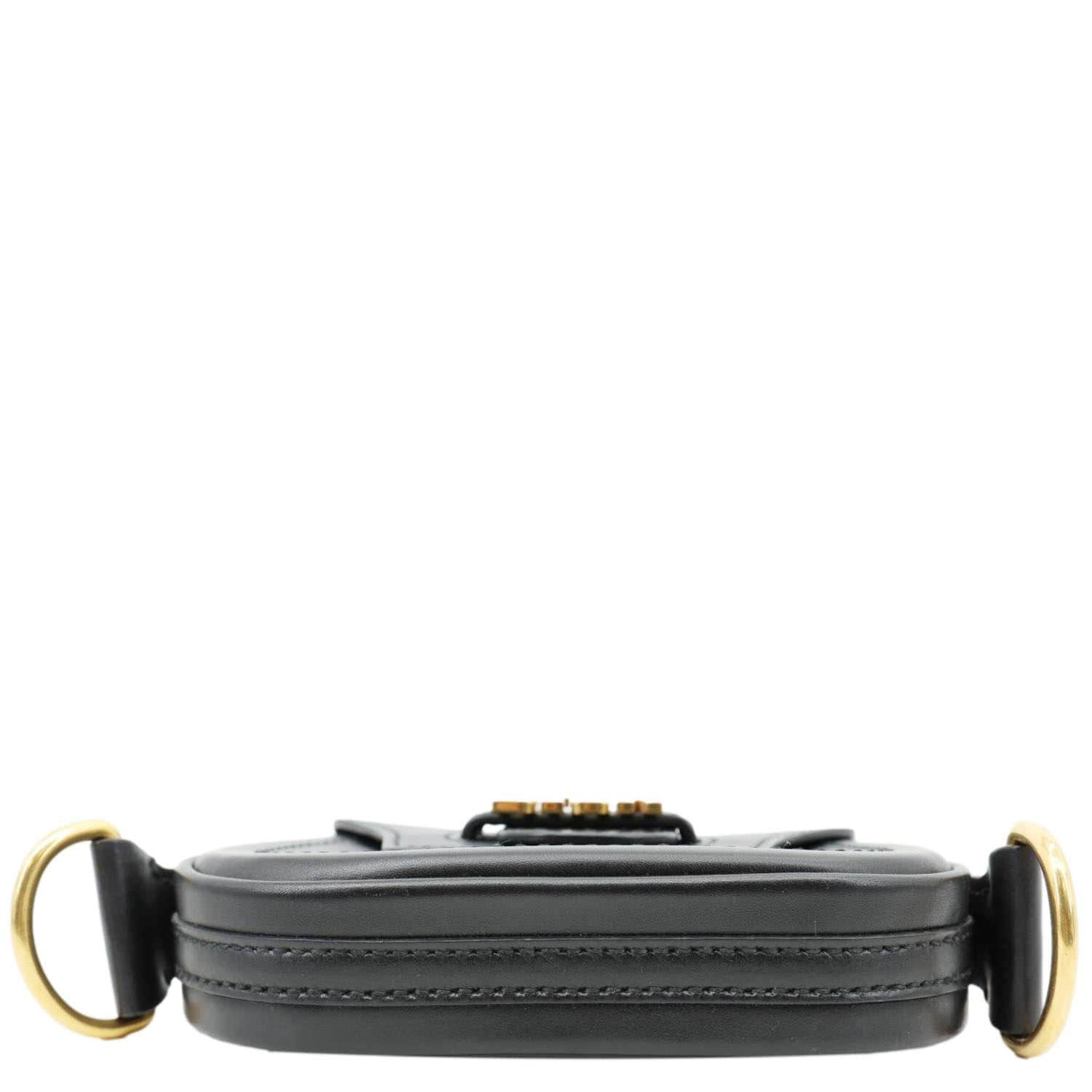 Side view of CHRISTIAN DIOR D Fence Small Calfskin Leather Saddle Bag Black with gold hardware, showcasing sleek design and craftsmanship.