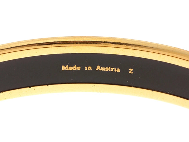 HERMES Hermès Enamel PM Multi/GP [471]N bracelet close-up showing 'Made in Austria Z' inscription, luxury accessory detail.