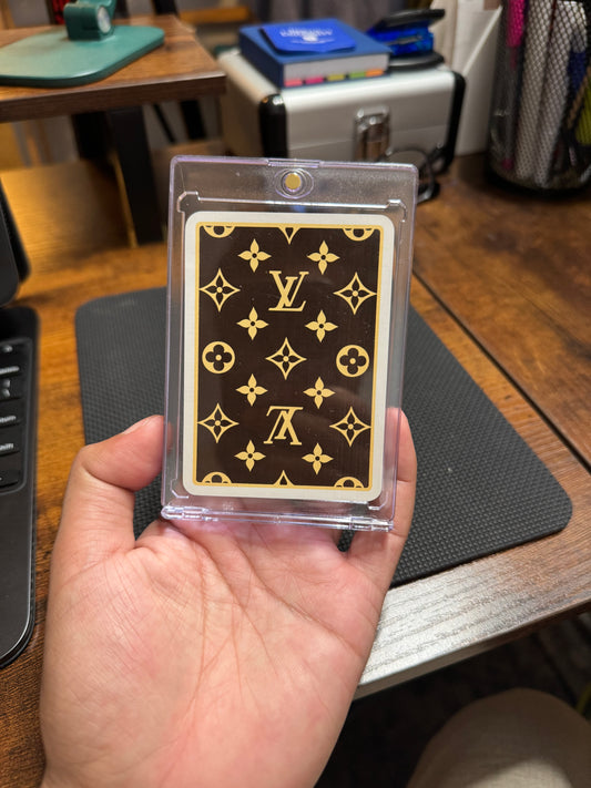 Louis Vuitton Monogram Playing Card – King of Diamonds – Brown & Gold – As Is in hand showing iconic pattern design
