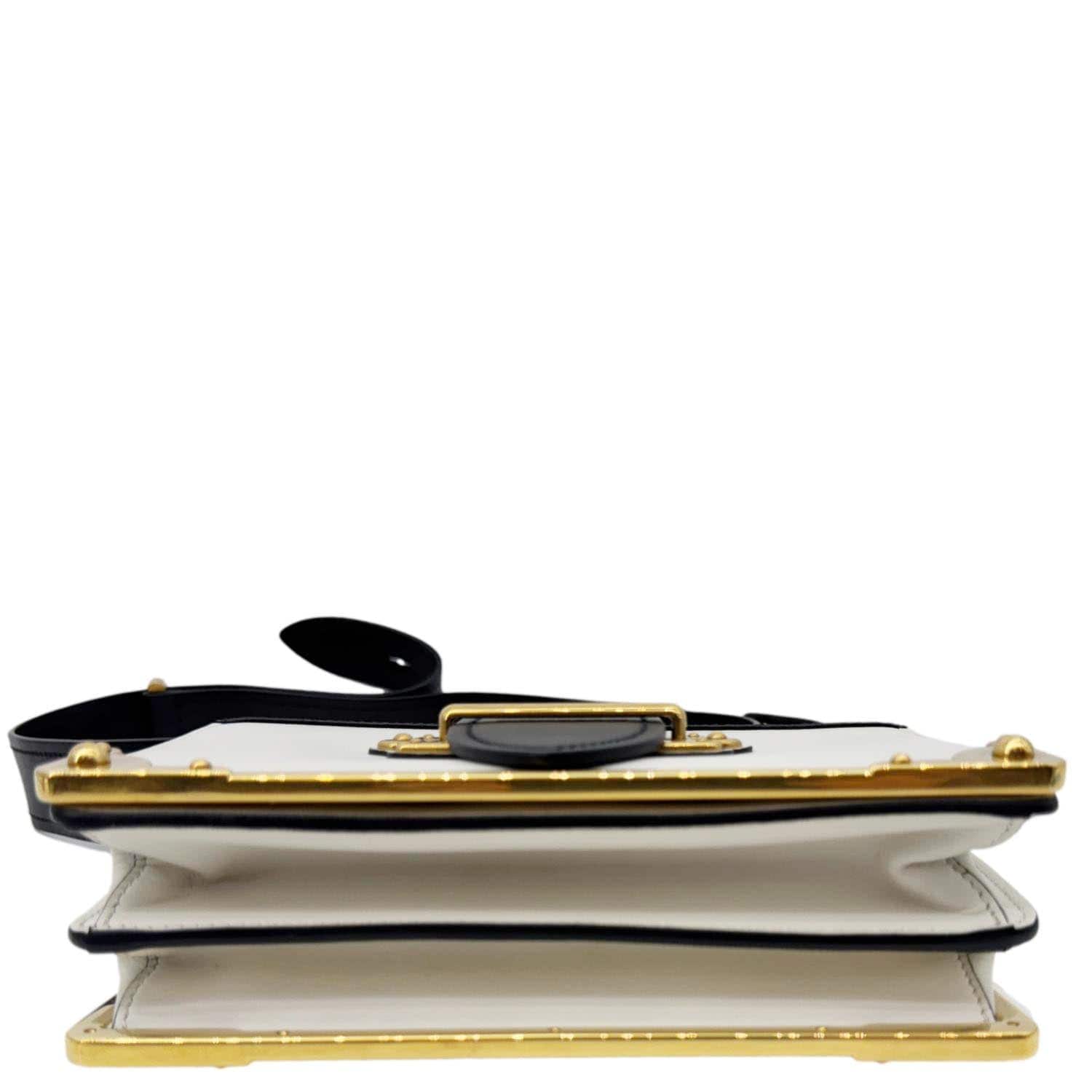 PRADA Cahier City Large Calf Saffiano Leather Shoulder Bag White with gold-tone hardware, side view showing structured vintage design.